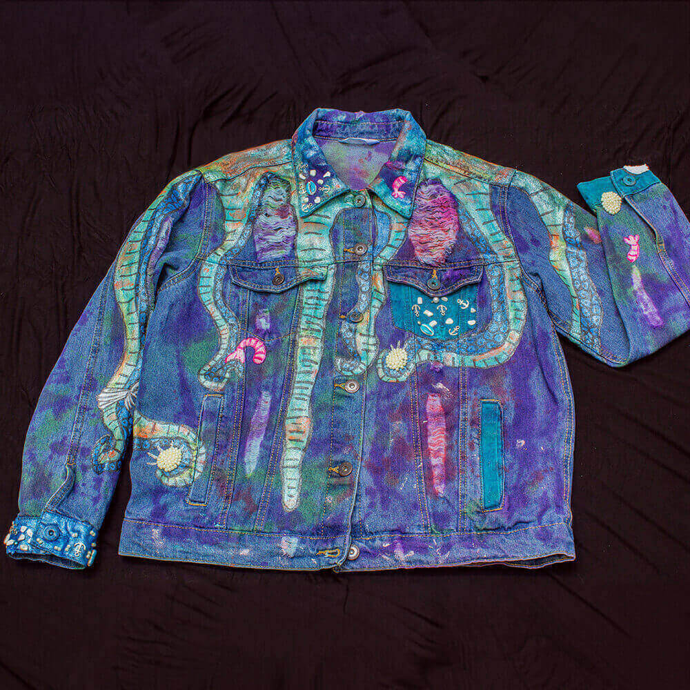 Front view of the "Deep Water Jacket," featuring painted tentacles and marine-themed beaded details.