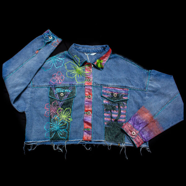 Front view of the "Miami Vice" jacket adorned with decorative flowers painted in neon colors.