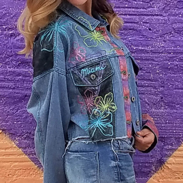 Model wearing the "Miami Vice" jacket, showcasing the right side with neon flowers detail.