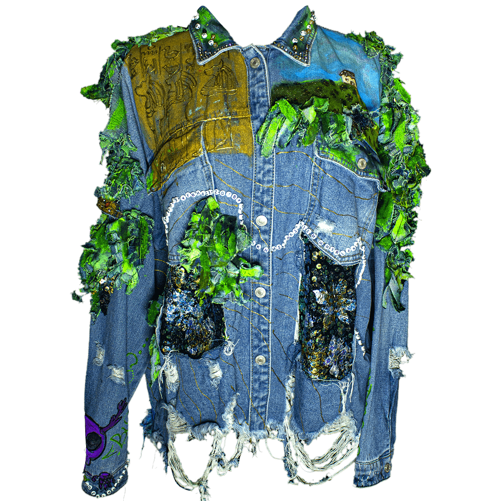 Front view of the Diana Uribe Customized Denim Jacket adorned with denim scraps, fabric sequins, 3D golden paint, details as a hieroglyphs drawing, details made with fabric paint and letter beads