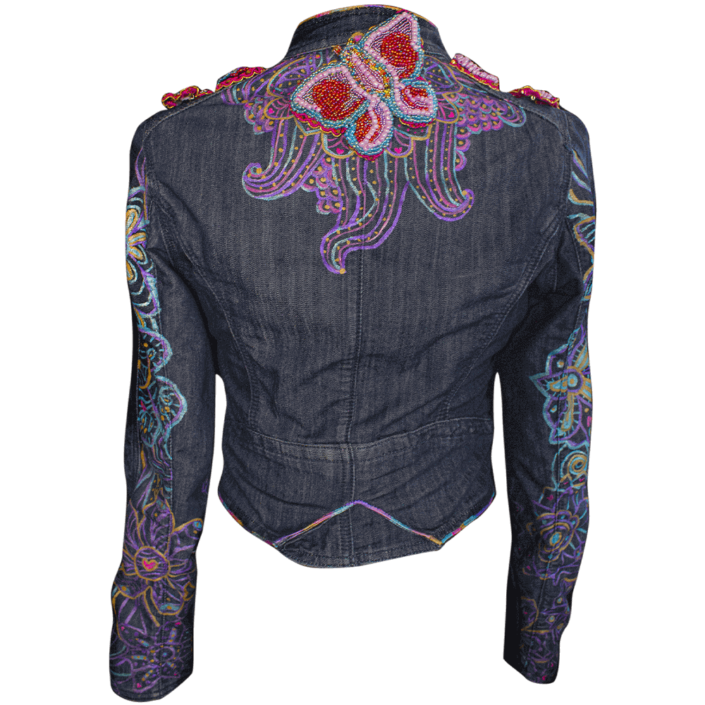 Back view of the personalized denim jacket - 'Eugenia Denim Jacket' decorated with a butterfly and stars beaded patches, mandala’s patter details with fabric paint, 3D paint and a color transition on the edges details