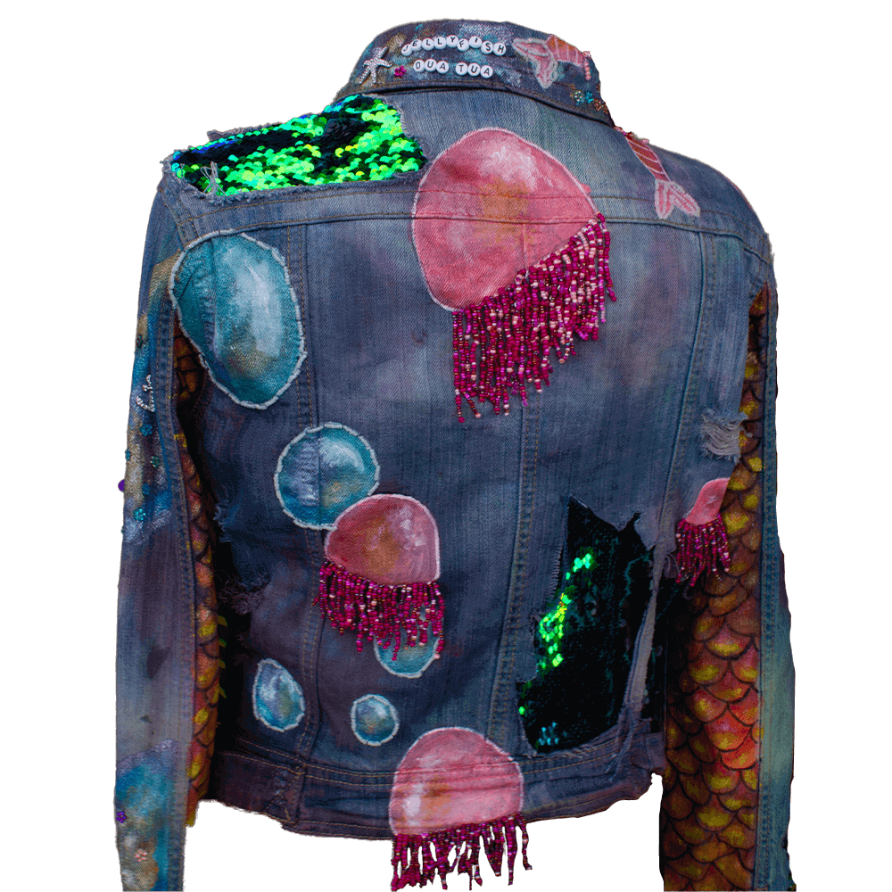 Back view of the Jellyfish denim Jacket, adorned with hand-painted jellyfish, sparkling sequins fabric on details, pink bead textures and scales paint texture on sleeves