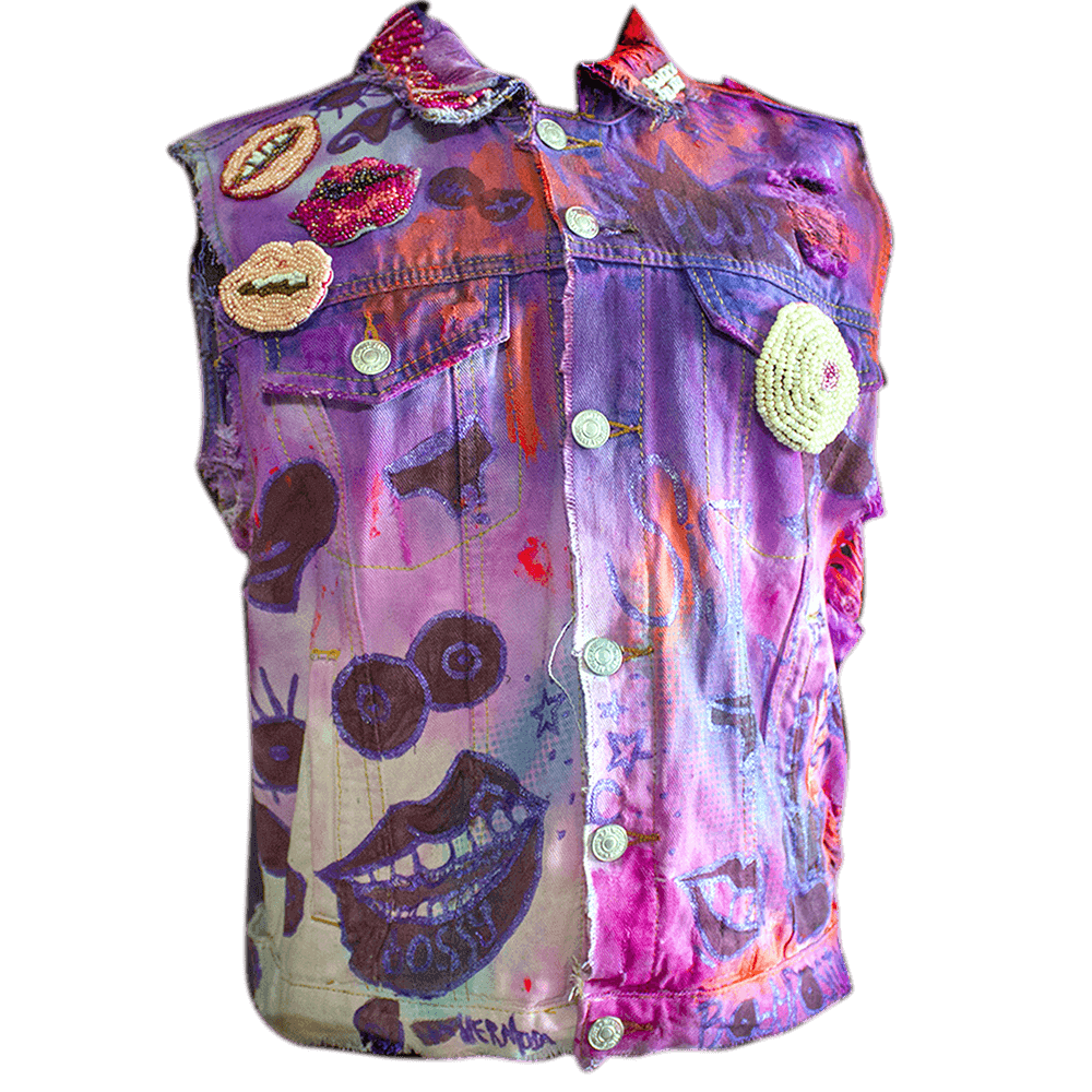 Front view of the Poderosa denim vest decorated with normal fabric paint, iridicent fabric paint and a pink tie dye process., embroidered round beads, letter beads details on collar and 4 removable beaded patches.