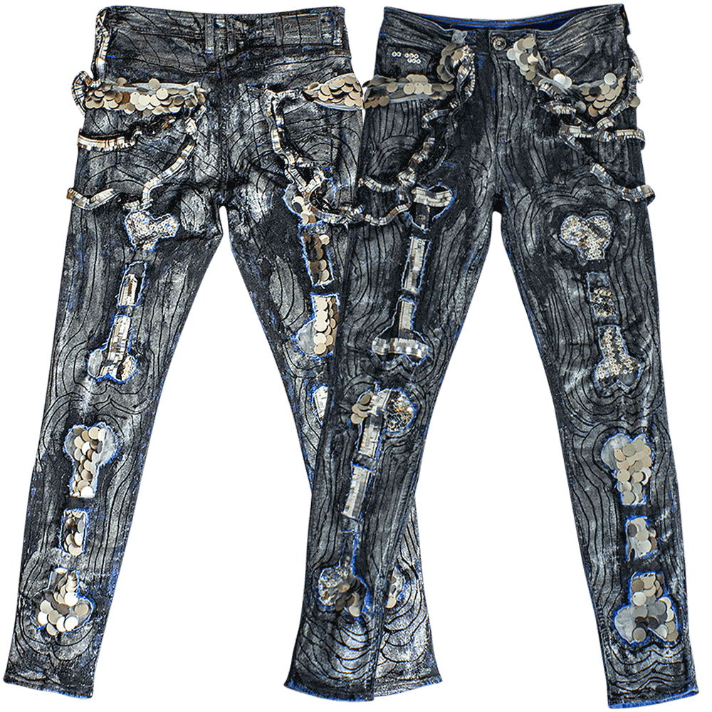 Front and back view of the White Bones Denim Pants reveals a striking design featuring black hand-made lines across the pants. The pants are further adorned with sequin bones made with large and small round silver sequins